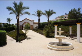 PRECIOSO BAJO CON JARDIN EN VERA PLAYA